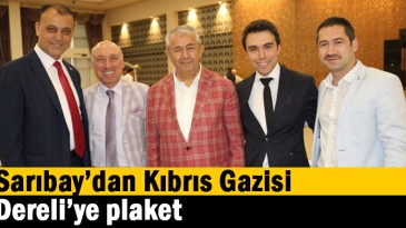 Sarıbay’dan Kıbrıs Gazisi Dereli’ye plaket