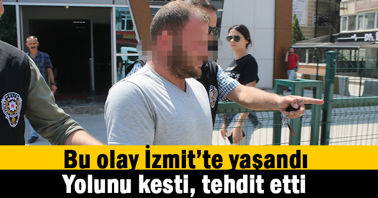 Yol kesip tehdit etmiş