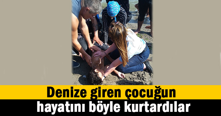 Sahilde denize giren çocuk ölümden döndü