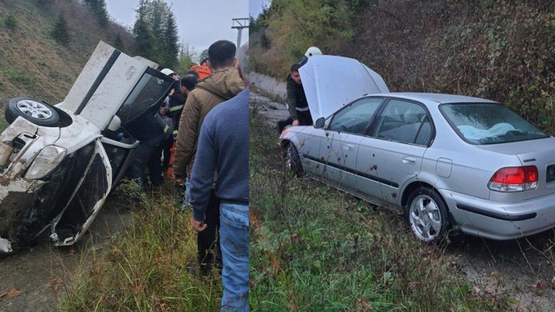 Kandıra yolunda iki otomobil su kanalına devrildi