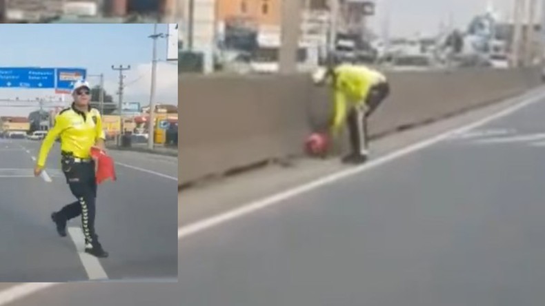 Yere düşen Türk Bayrağını almak için trafiği durdurdu