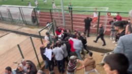 Tellere çıkan futbolcu, çivili kramponla taraftara tekme attı