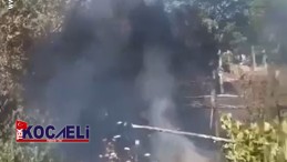 Kırık cam şişeleri otluk alanı tutuşturdu