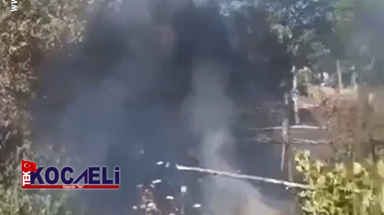 Kırık cam şişeleri otluk alanı tutuşturdu