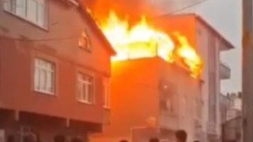 Binanın çatısında çıkan yangın yan binaya sıçradı; 1 kişi hastaneye kaldırıldı